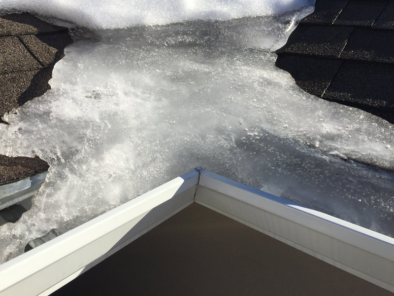 ice dams on edge of the roof